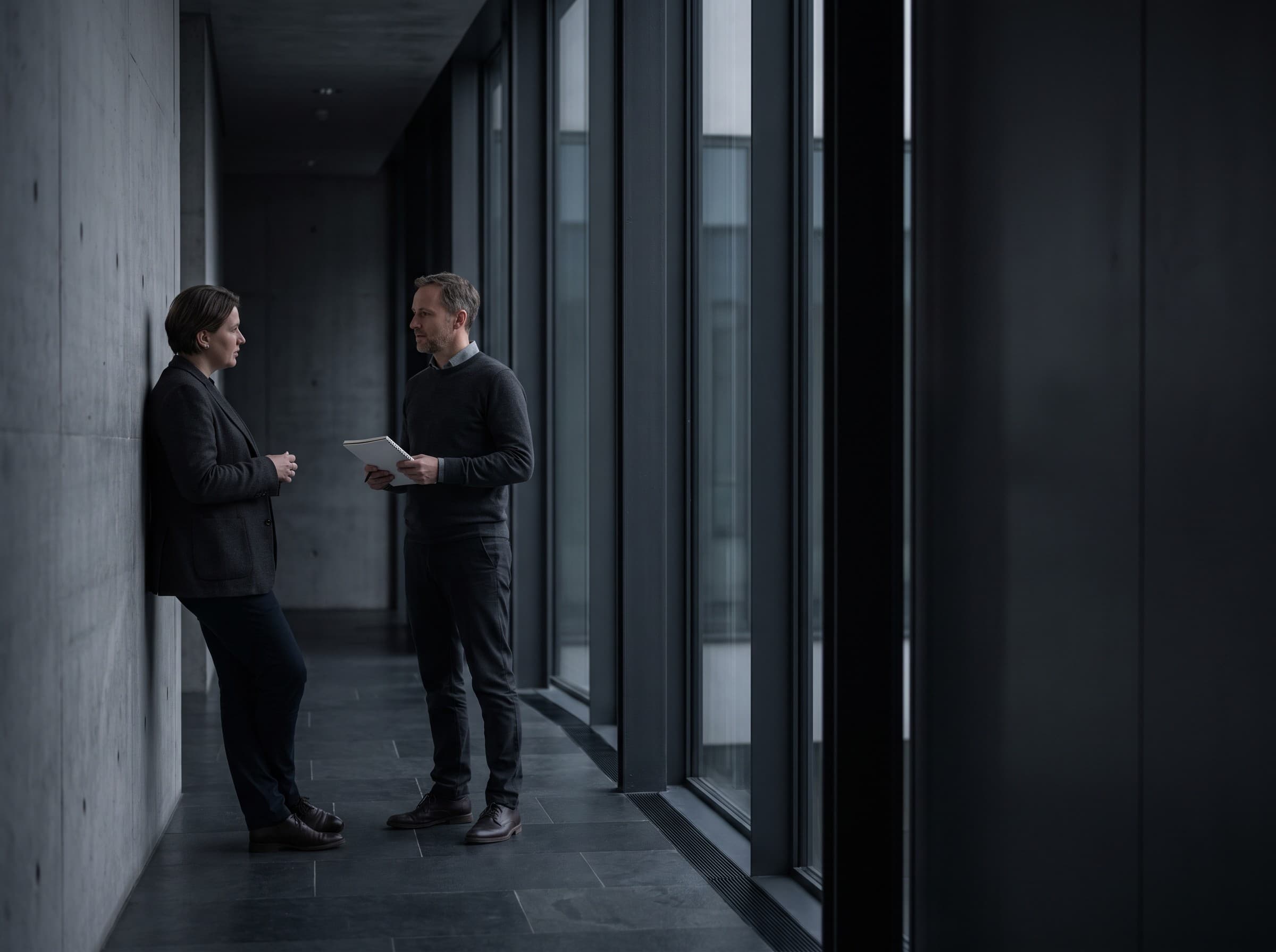 Colleagues discussing a decision calmly